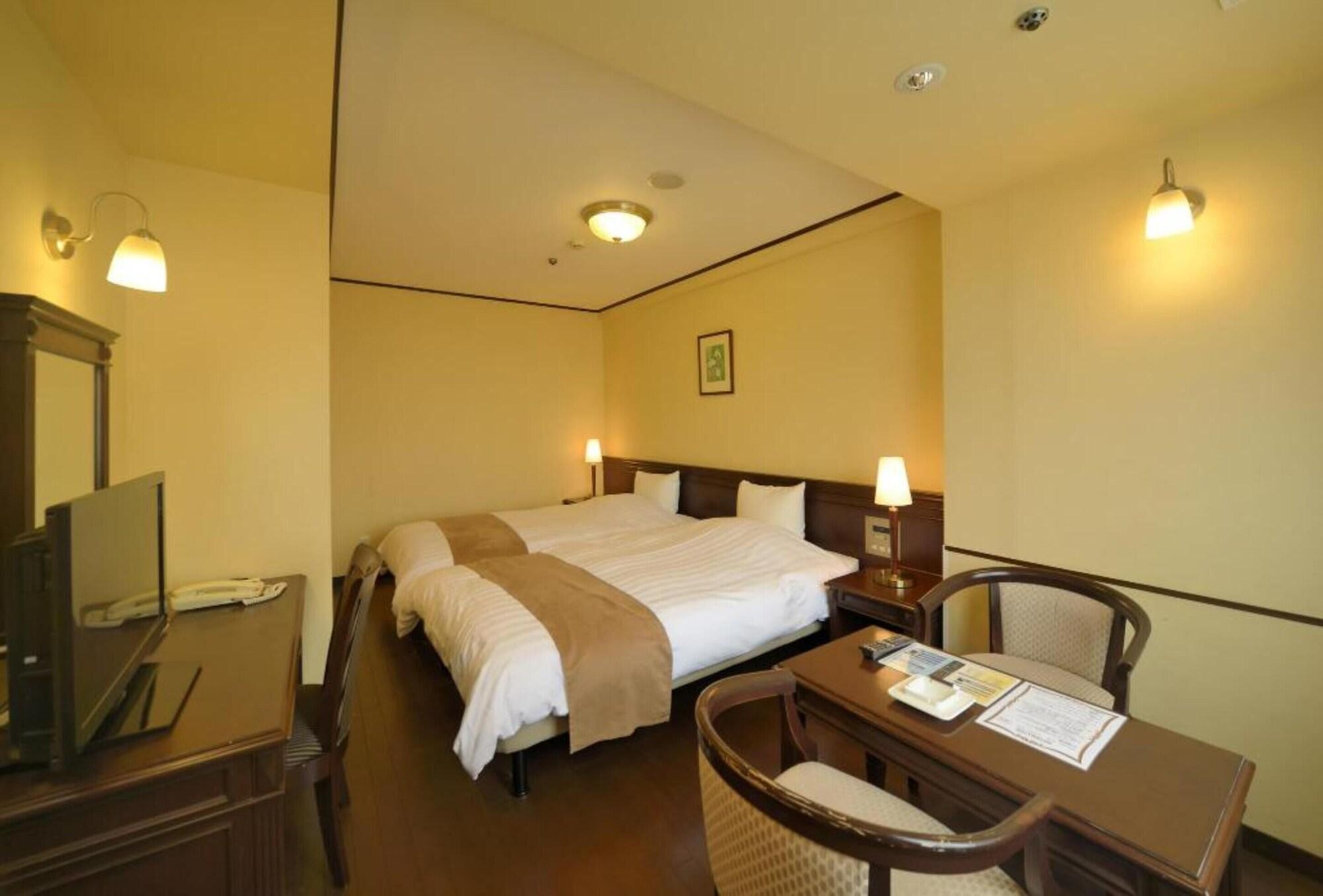 Amami Sunplaza Hotel Exterior photo