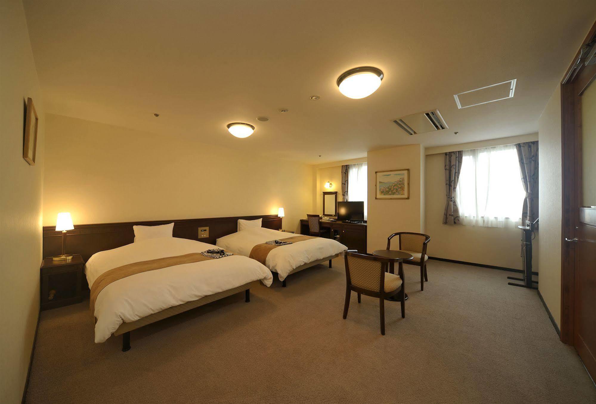 Amami Sunplaza Hotel Exterior photo