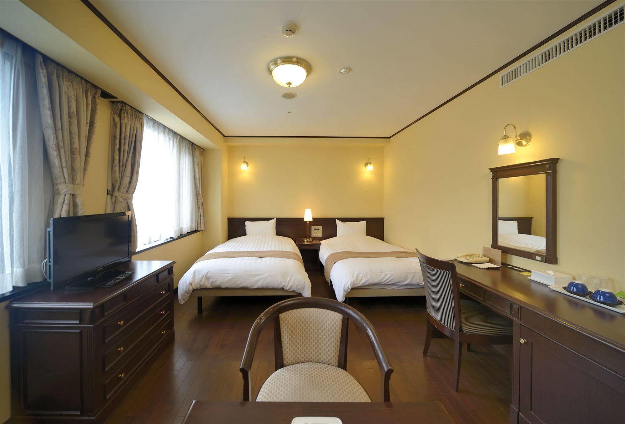 Amami Sunplaza Hotel Exterior photo