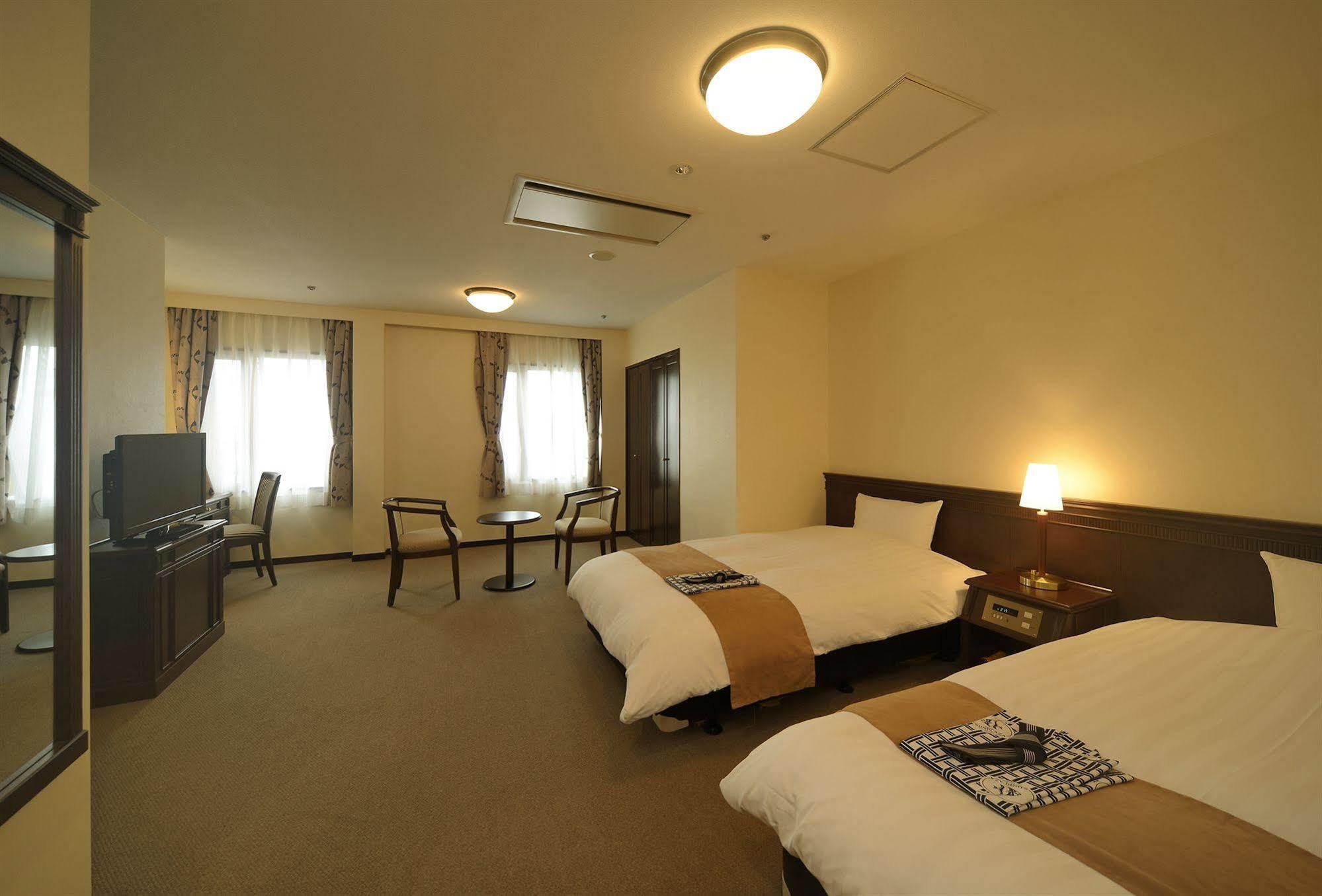 Amami Sunplaza Hotel Exterior photo