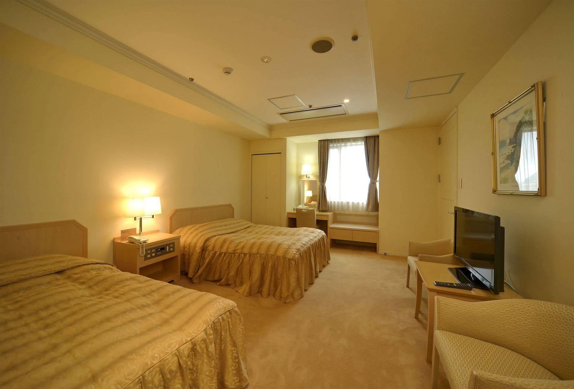 Amami Sunplaza Hotel Exterior photo